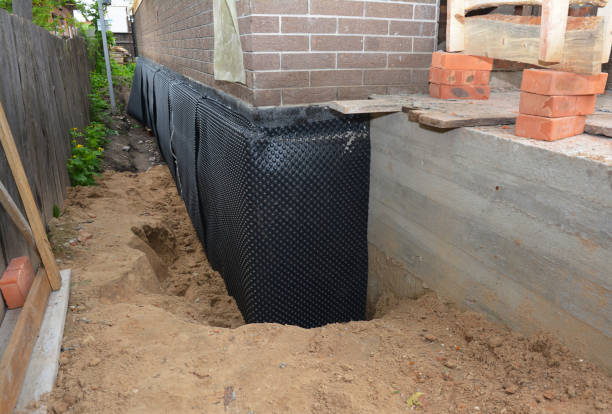Happy homeowners after waterproofing job in Thorofare